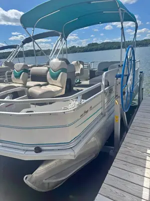 Boat, hoist and trailer