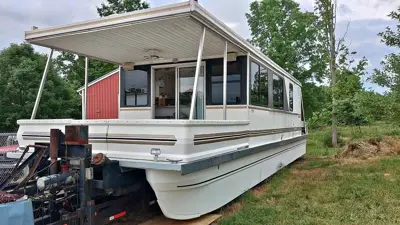 video added -2003 Catamaran Aqua Cruiser 12×46 with Hydraulic Trailer