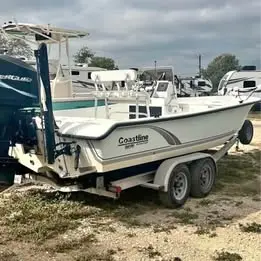 2110 action craft tournament edition with Mercury 150hp 2 stroke and magic tilt 2 axle trailer