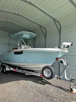 2021 Pioneer 222 Islander w/EZ Load dual axel trailer with ONLY 61.7 hours