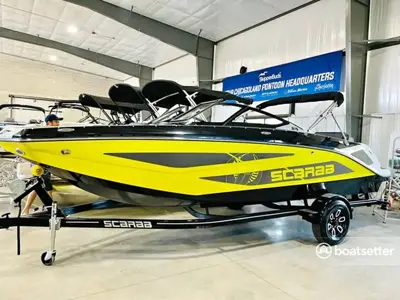 Scarab Jet boat 215ID/IMPULSE in atomic yellow