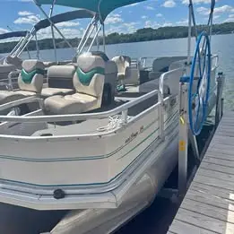 Boat, hoist and trailer