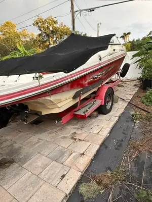 For sale: 23-foot Rinker boat and trailer.