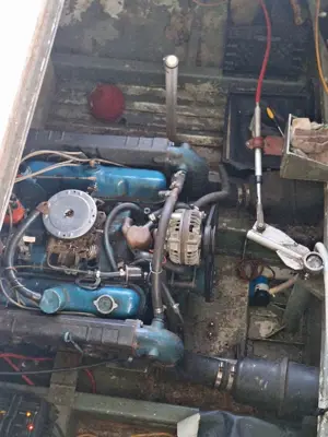 1971 all alluminum KingCraft Houseboat. 35 ft. long and 12 ft. wide. Single 318 engine. runs great.