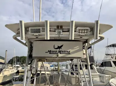 23' Mako CC boat 1982 with 260hp Inboard and tandem axle trailer.