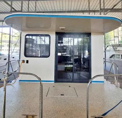 For Sale - 1989 Wavelength Houseboat - Custom Built, out of Tennessee. 32 x 13 feet.