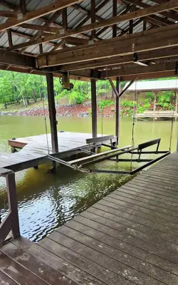 24' Covered boat slip for rent with lift and power - for bass boat Located on Weiss Lake, Centre, AL