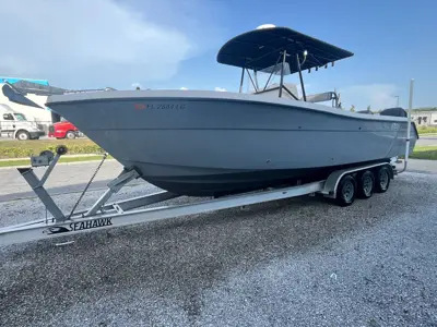 ‘99 Pursuit 2870 center console w/ 300 Suzuki’s