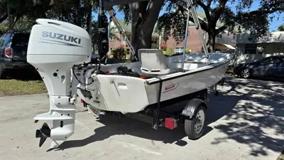 Boston Whaler Boat with Suzuki 40HP and Trailer