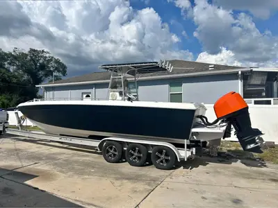 2001 29ft Baja Boat Twin Yamaha 225s Orange Interior trailer is included or better offer