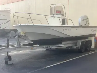 Boston Whaler Outrage 19’ 225 Honda tandem axle aluminum trailer