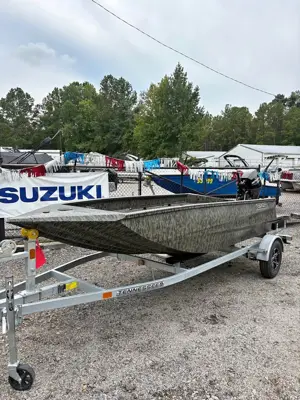 2026 Edge 553 Sportsman powered by a 25HP Mercury.