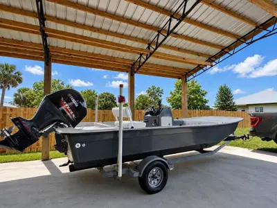 flats boat with a 2022 Yamaha SHO 115 outboard!