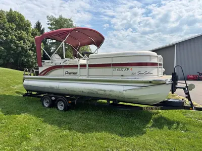 2011 Premier “Tritoon” & Trailer 220 Sunsation (115hp) 270hrs
