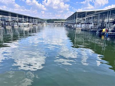12x28 covered slip with 8000 lb hoist - Lake Travis Lodges Marina